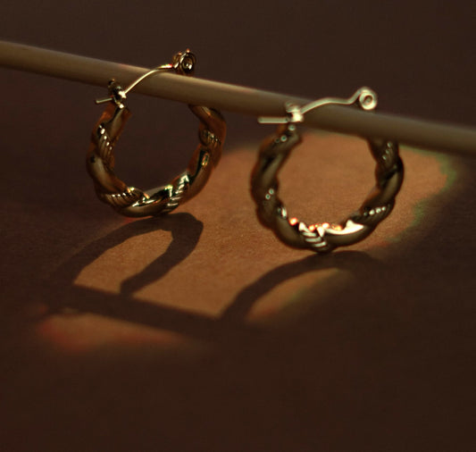 Golden twisted hoop earrings