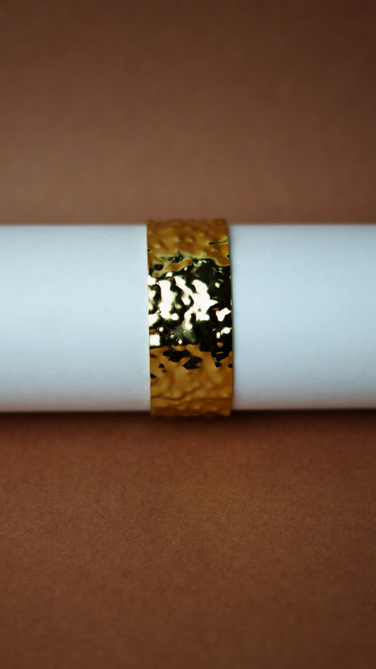 Golden hammered bracelet