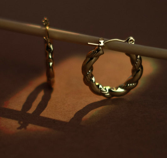 Golden twisted hoop earrings