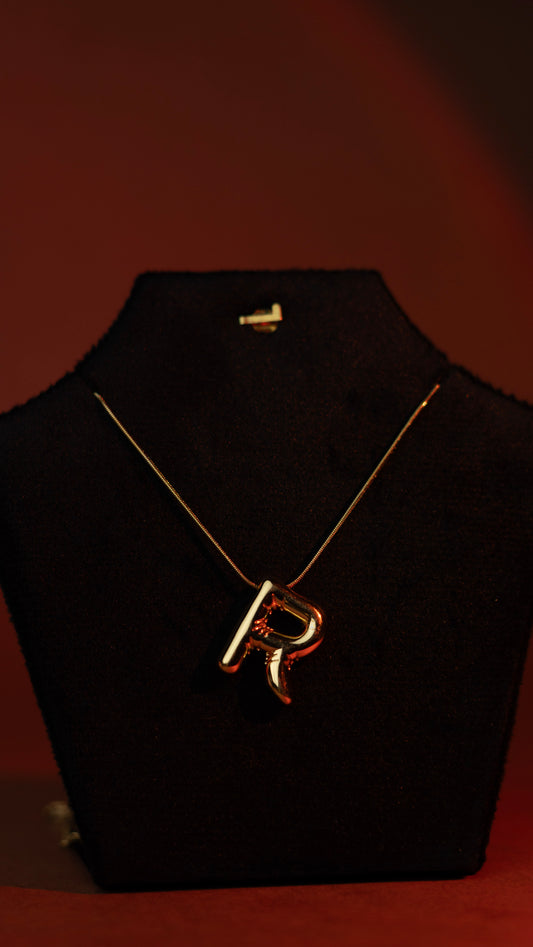 Elegant initial “R” pendant