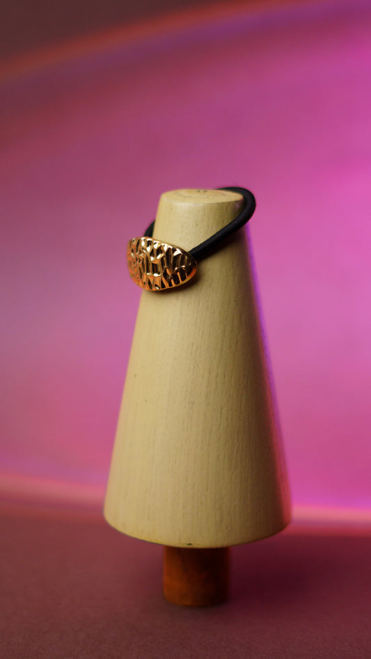 Gold cratered hair tie