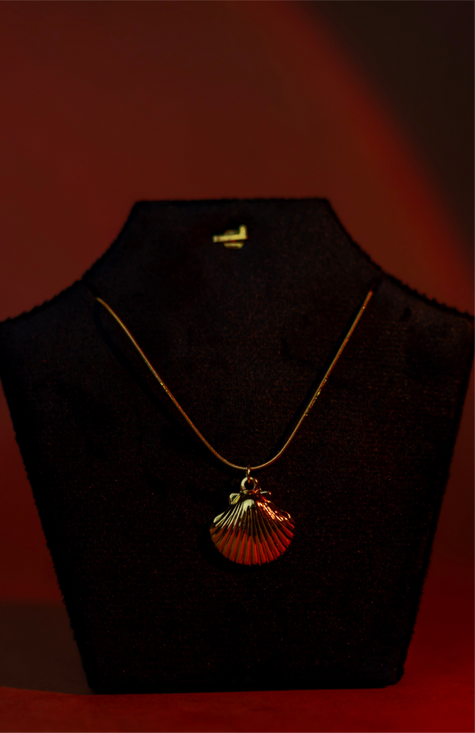 Golden shell pendant