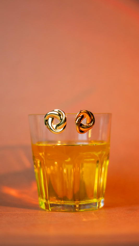 Golden twisted loop earrings